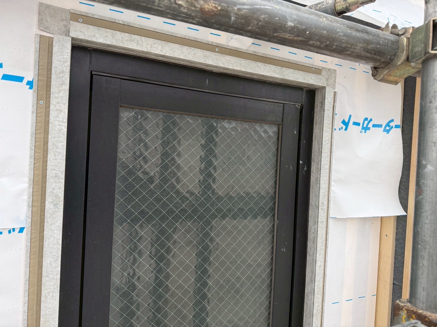 タイル部分金属サイディング張り工事