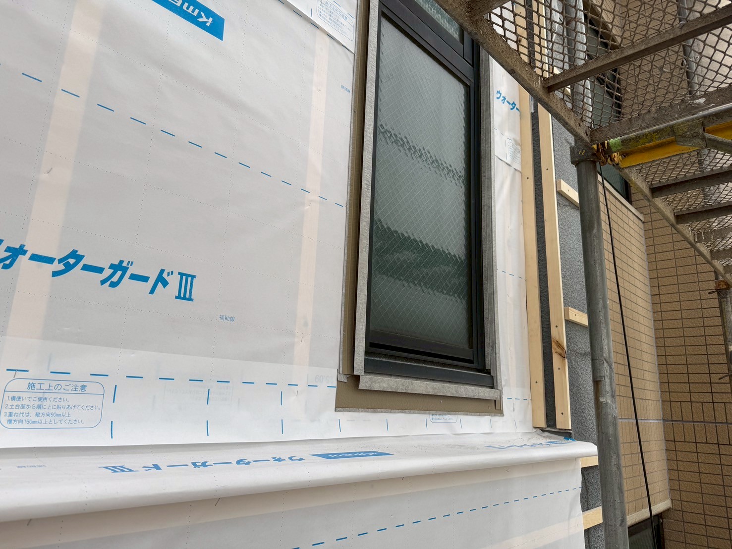 タイル部分金属サイディング張り工事